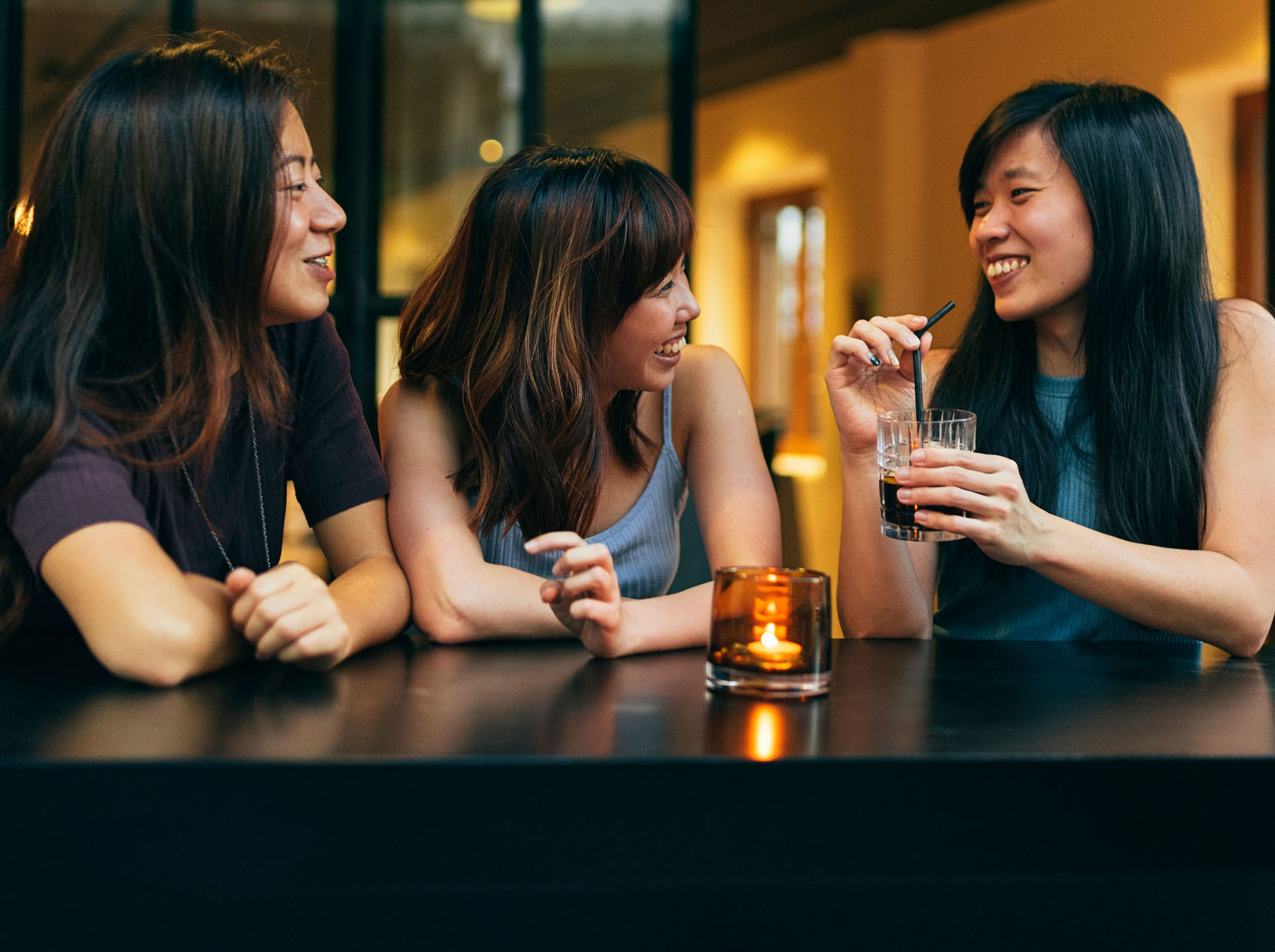 Three women having a drink